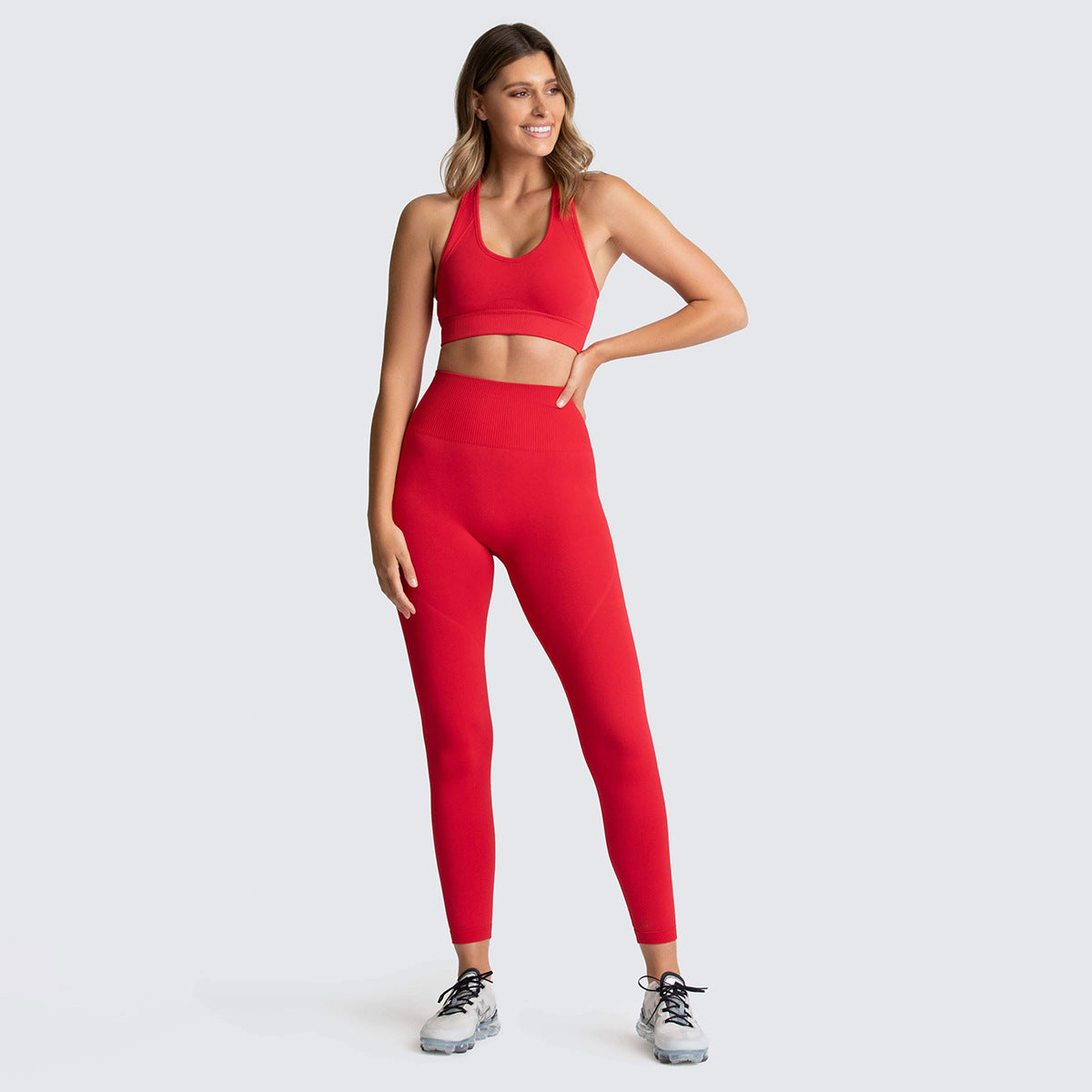 Prune seamless racer bra and legging set in red, front
