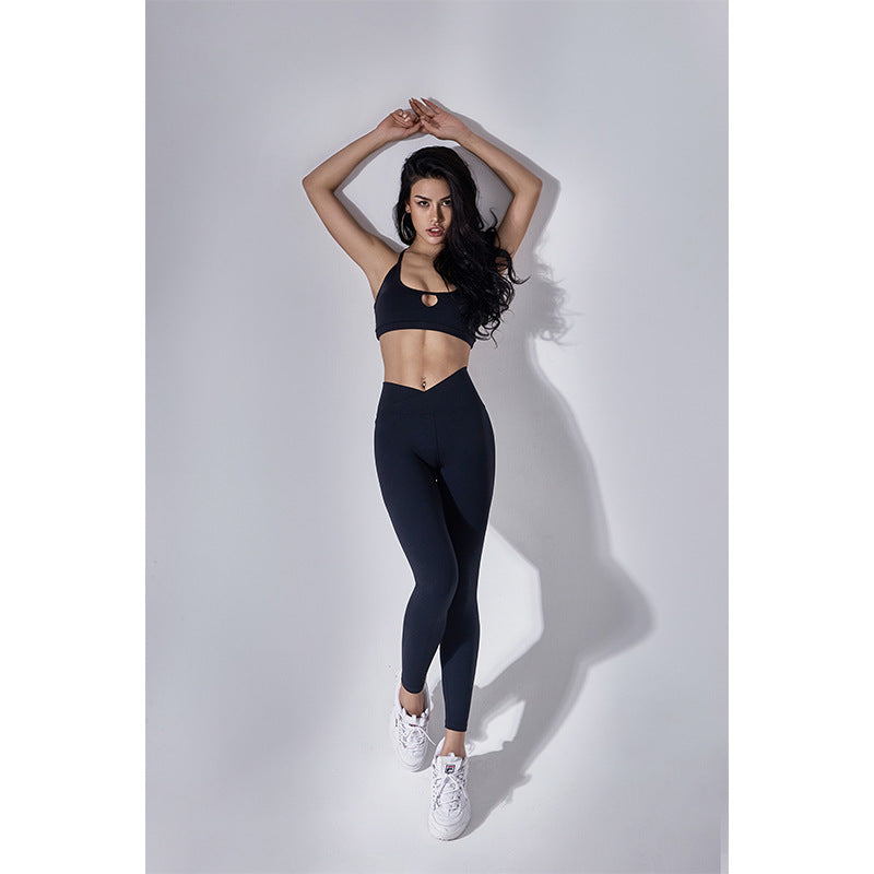 Grenade strappy-back bra and legging set in black, front