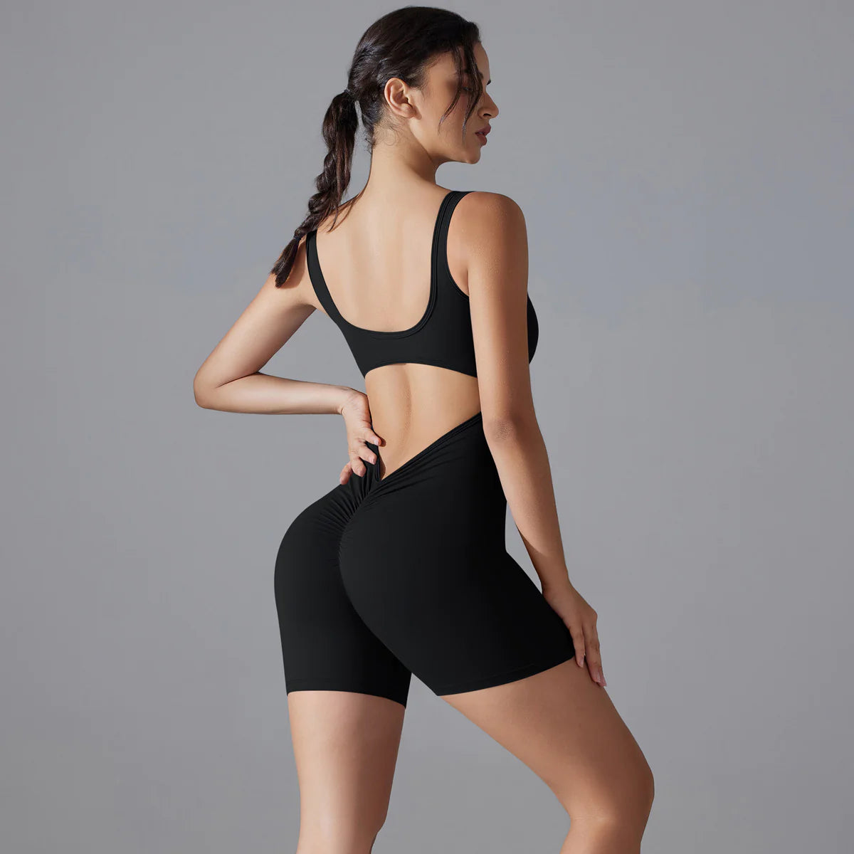 Pointe V-back scrunch shorts romper in black, back