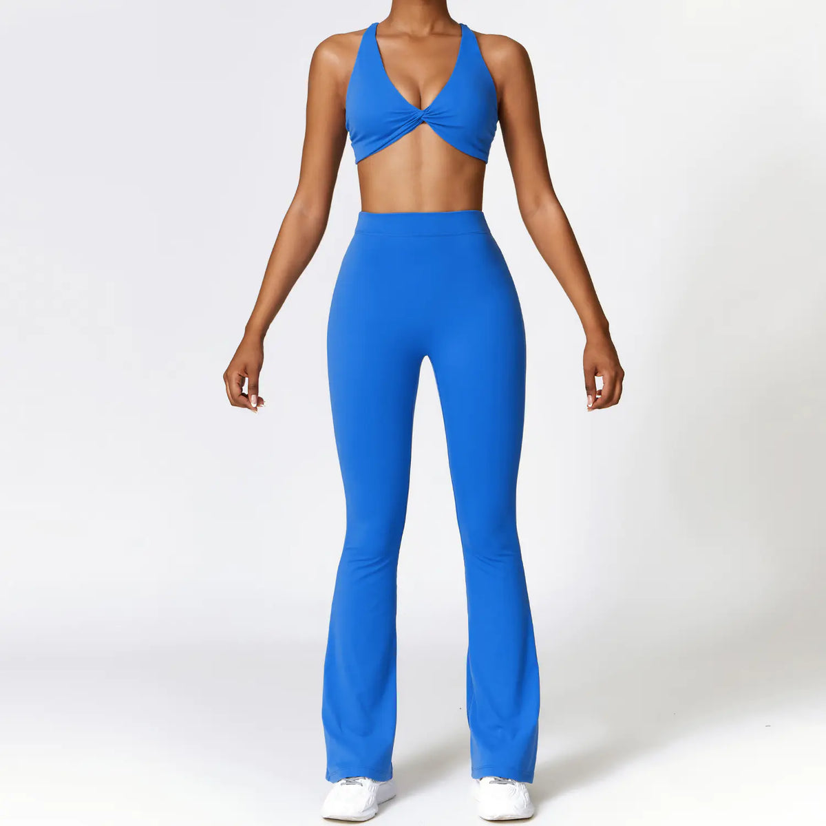 Volute twist halter bra and flared legging set in cobalt, front