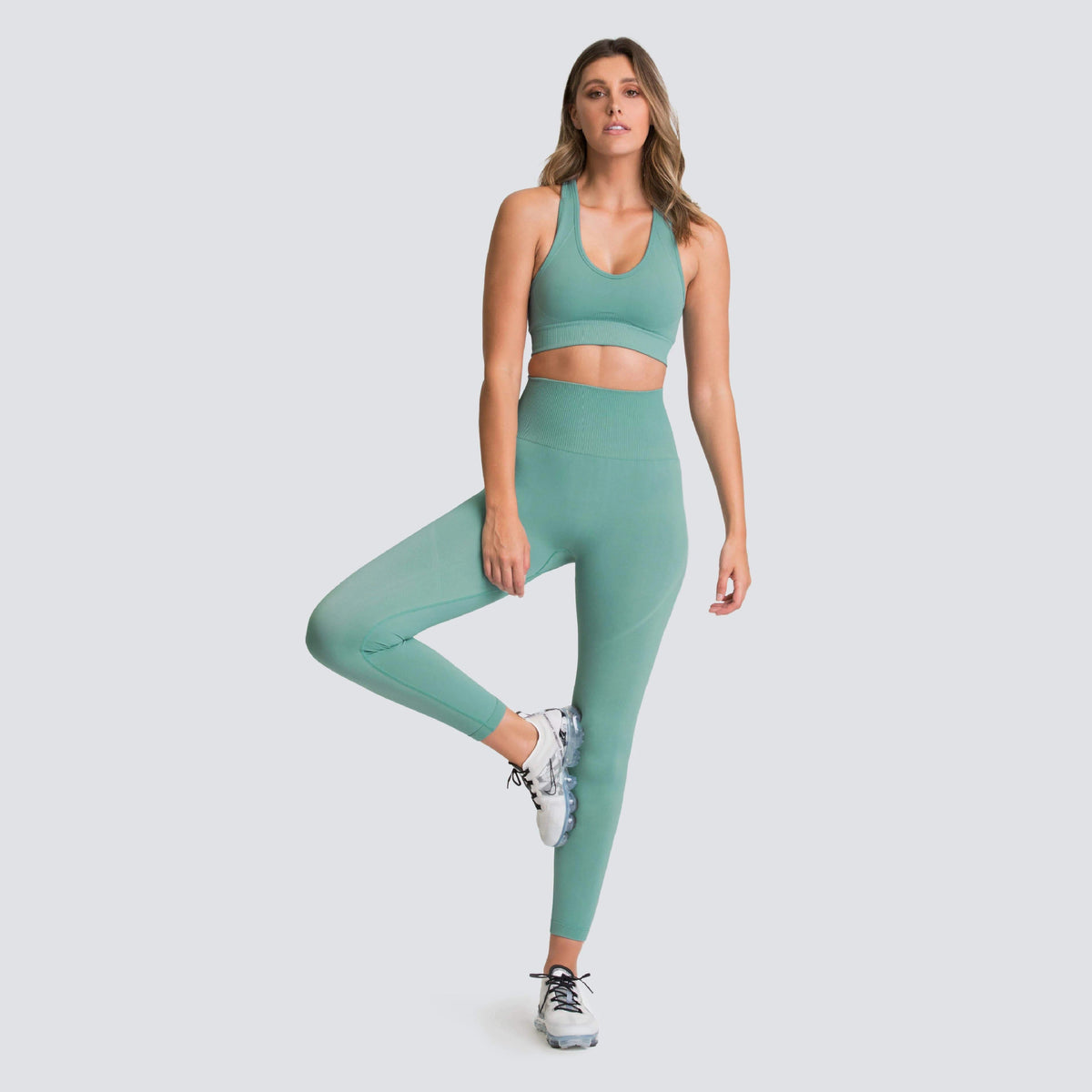 Prune seamless racer bra and legging set in mint, front